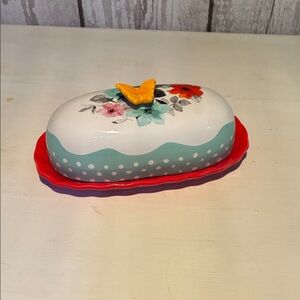 Pioneer Woman Floral Ceramic Butter Dish with Red Base and Yellow butterfly.
